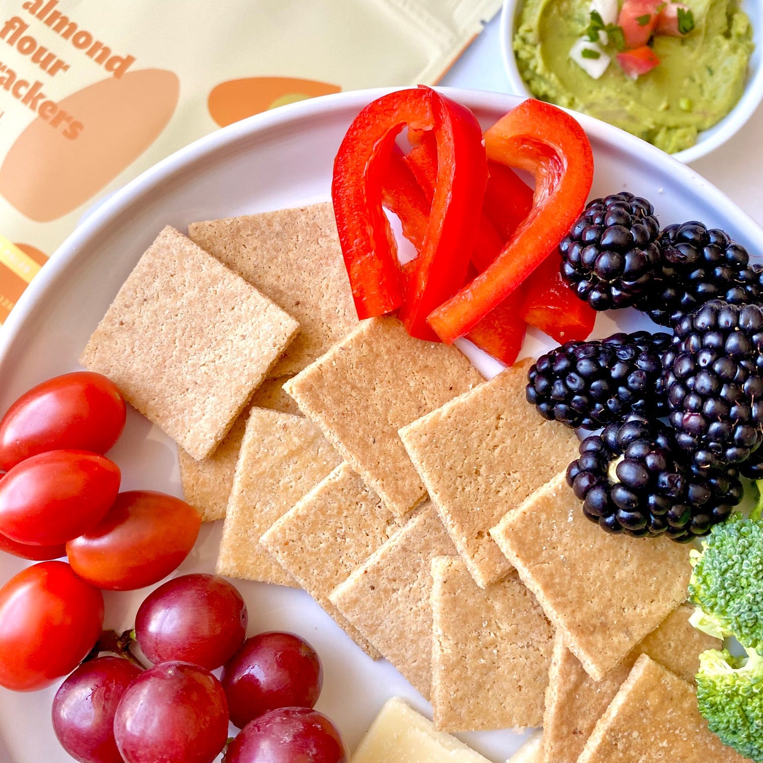Real Phat Food Crackers paired with meats, cheese and fruit.