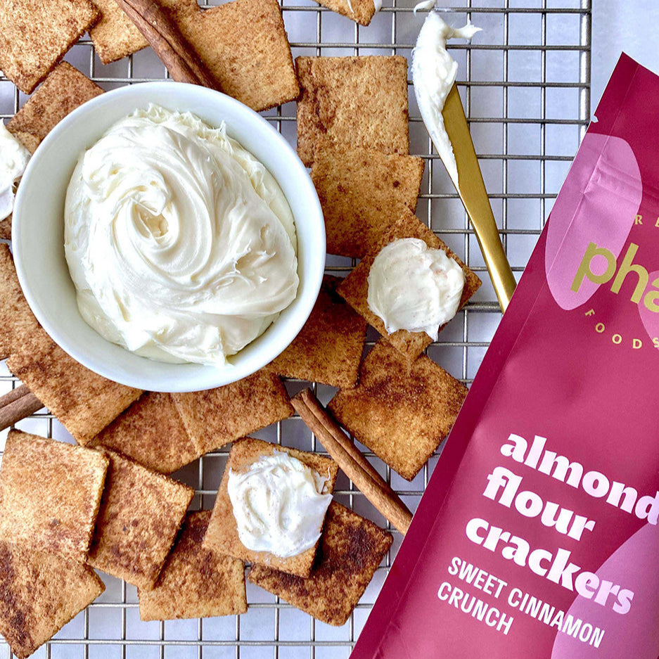 Real Phat Foods Almond Flour Crackers in Sweet Cinnamon Crunch being iced for additional flavor