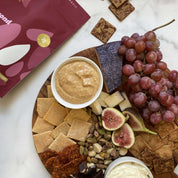 Real Phat Foods Almond Flour Crackers in Sweet Cinnamon Crunch served on a charcutier board